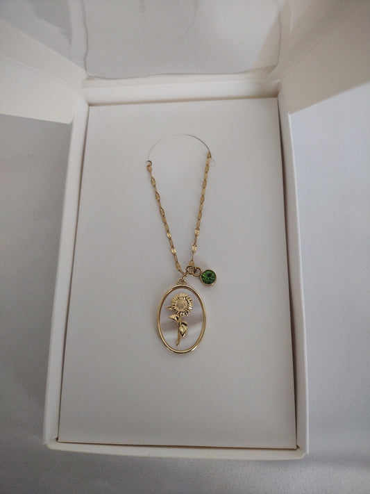 Golden sunflower & peridot charm